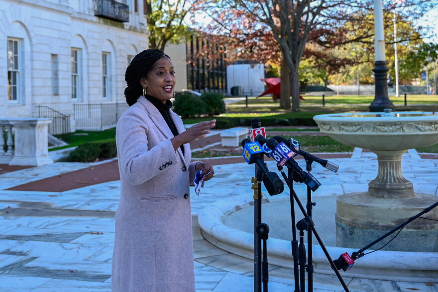 Congresswoman Jahana Hayes speaks outside Waterbury City Hall Wednesday. She declared victory, claiming the 5th Congressional District again. As she walked away, she joked "this is my victory party."