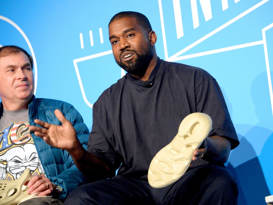 Steven Smith and Kanye West speak on stage at the "Kanye West and Steven Smith in Conversation with Mark Wilson" on Nov. 7, 2019, in New York City.