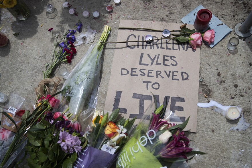 A memorial for Charleena Lyles is shown outside of Solid Ground Brettler Family Place on Monday, June 19, 2017.