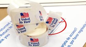 Rolls of "I Voted" stickers.