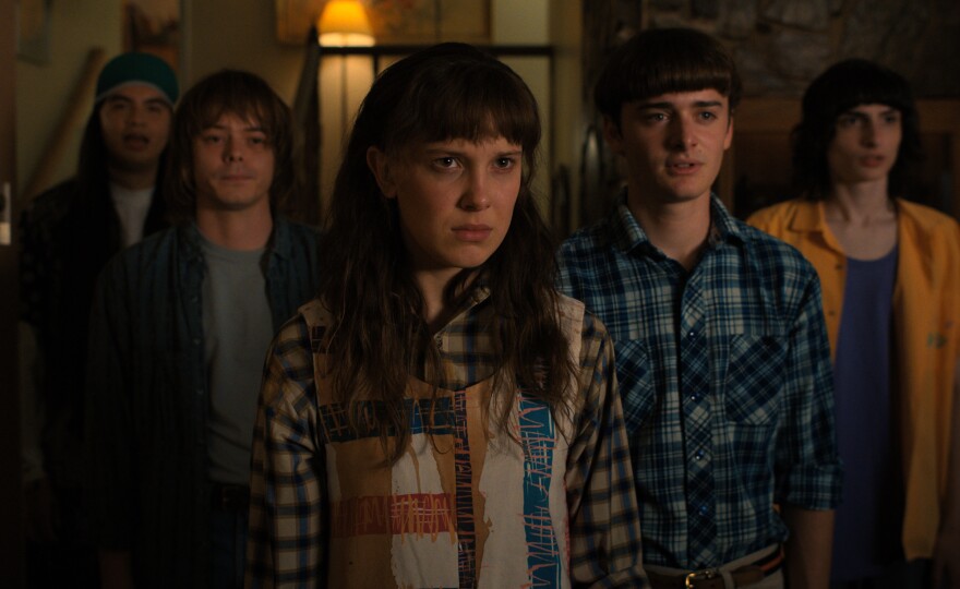 Eduardo Franco as Argyle, Charlie Heaton as Jonathan, Millie Bobby Brown as Eleven, Noah Schnapp as Will, and Finn Wolfhard as Mike.