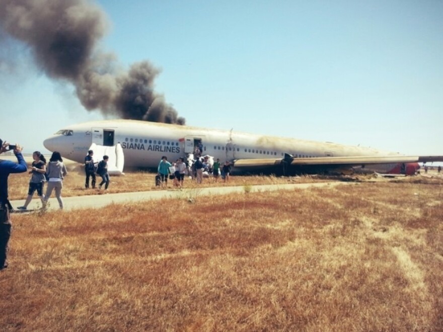 A photo that passenger David Eun tweeted shortly after, he wrote, he and others on board escaped from Asiana Flight 214.