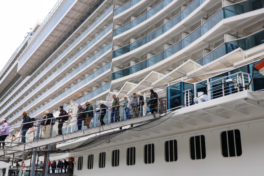 Cruise ship visitors exit the Discovery Princess in downtown Juneau on Monday, June 10, 2024.