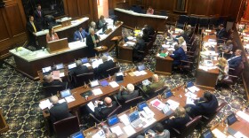 FILE - In this March 11, 2020 file photo, Rep. Don Lehe, R-Brookston, speaks during an Indiana House session at the Statehouse in Indianapolis. Indiana lawmakers are preparing to move much of their 2021 legislative session activity out of the Statehouse over coronavirus concerns. A joint House-Senate committee on Wednesday, Sept. 9 endorsed a plan aimed at allowing the 100-member House hold its floor sessions and committee meetings in the auditorium and conference rooms in a state office buildin