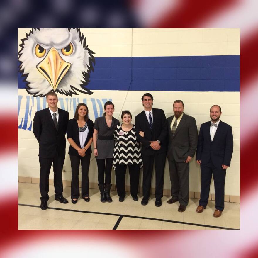 Iantria (center) with students after presenting the Homegrown Highway project in Fordland