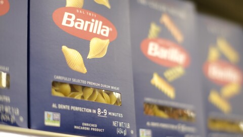 Pasta made from durum wheat line the shelves at a grocery store.