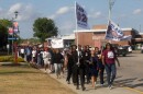 Students at South Carolina State University in Orangeburg County march through campus Wednesday, April 29.