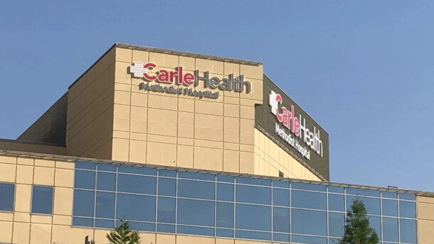 A medical building that says "Carle Health Methodist Hospital"