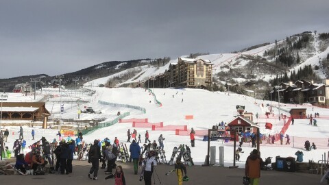 Skiers and snowboard riders converge at the base of Steamboat Ski Area in January, 2018. The city of Steamboat has revived a lift ticket tax proposal after alleging the resort 'reneged' on a 20-year pledge to invest in regional transit.