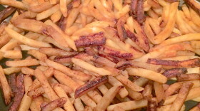 French fried potatoes in a skillet