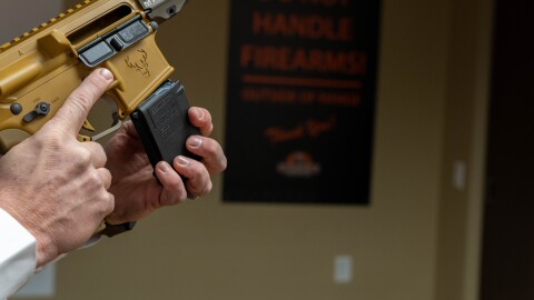 Nephi Cole, director of government relations state affairs for the National Sports Shooting Foundation, loads and unloads a 10-round magazine from an AR-15 semiatuomatic rifle at Bristlecone Shooting, Training and Retail Center in Lakewood, Colorado, on Thursday, Jan. 16, 2025. The Colorado legislature is considering a bill that would ban the manufacture, purchase and sale of semiautomatic rifles and shotguns that are capable of accepting detachable ammunition magazines, as well as some semiautomatic pistols and handguns. (Jesse Paul, The Colorado Sun)