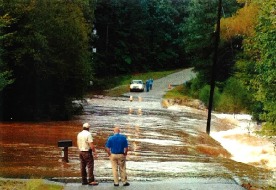 Stephen Blackwelder and a friend at a Flooded Gills Creek Drive.