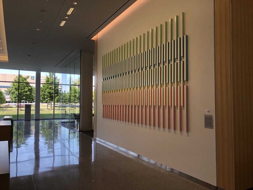 Rana Begum's paint and powder coated aluminium artwork hangs prominently on the first floor of the Clinic's Taussig Cancer Center.