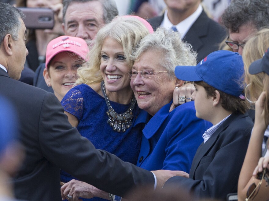 Kellyanne Conway poses with then-Alabama Lt. Gov. Kay Ivey last year. Ivey is now governor and said she's still voting for Roy Moore even though she said she has no reason to disbelieve his accusers.