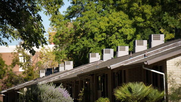 Air conditioners line the roof over a set of townhomes in St. George, Utah, Aug. 26, 2026.