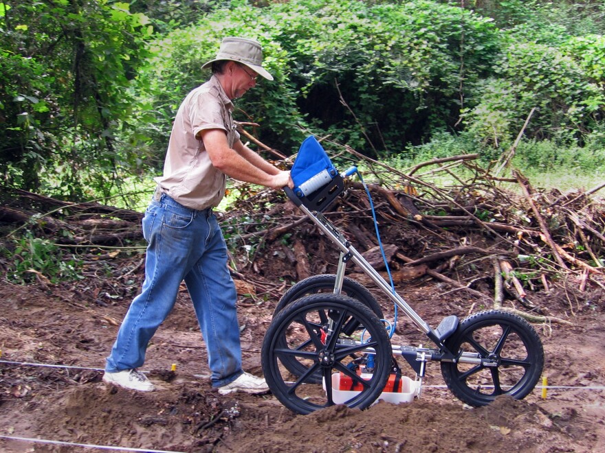 Using ground penetrating radar, archaeologist Richard Estabrook has identified dozens of previously unknown graves at the school's cemetery.