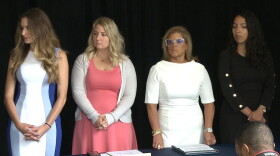 From left, Niki DaSilva, Gabrielle McLemore, Rep. Mara Candelaria Reardon (D-Munster) and Samantha Lozano at a press conference in June.