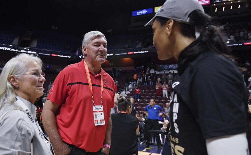 Bill Laimbeer congratulates the Las Vegas Aces' A'ja Wilson (right) after her team's win in the WNBA basketball Finals against the Connecticut Sun, Sunday, Sept. 18, 2022, in Uncasville, Conn.