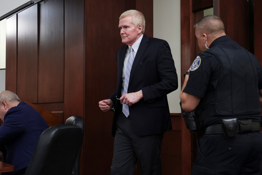 FILE - Alex Murdaugh enters the courtroom for a hearing, Aug. 14, 2026, at the Marc H. Westbrook Judicial Center in Lexington, S.C. (Tracy Glantz/Pool Photo via AP, File)