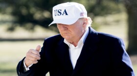 President Trump gives a thumbs up to members of the media as he walks across the South Lawn as he arrives at the White House in Washington, Sunday, Jan. 7, 2018, after traveling from Camp David, Md. (Andrew Harnik/AP)