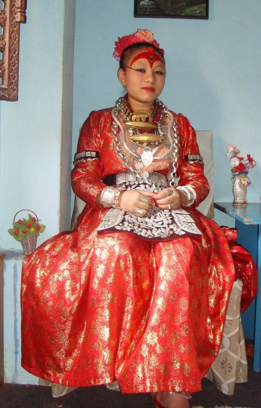 Chanira Bajracharya, now 19, was a Living Goddess. She held the position from age 5 to 15, then relinquished it in keeping with the centuries-old tradition. In this undated photo, she's shown in her regalia when she was still a Kumari.