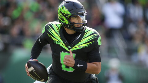 Oregon quarterback Dylan Raiola (8) runs the ball during the first half of an NCAA college football game against UCLA, Saturday, Oct. 10, 2026, in Eugene, Ore.
