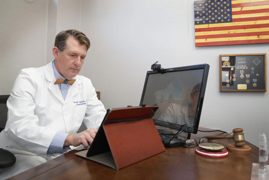 George Monks, a Tulsa dermatologist and former president of the Oklahoma State Medical Association, in his office Dec. 30, 2025.