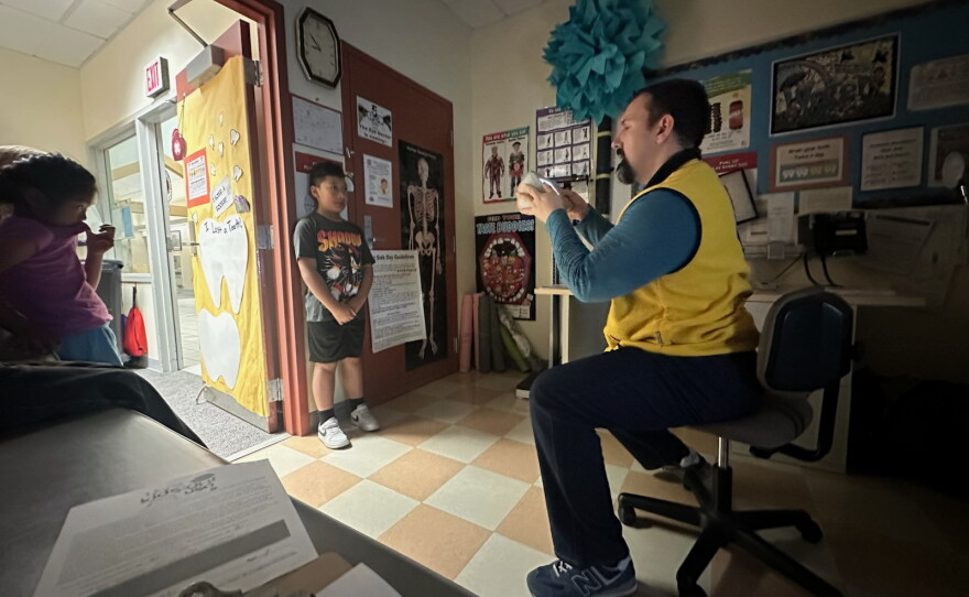 Optometrist Patrick Campaign screens a student's vision in Unalaska in August 2026.