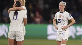 United States' Megan Rapinoe, right, reacts with her teammates following their loss to Sweden in their Women's World Cup round of 16 soccer match in Melbourne, Australia, Sunday, Aug. 6, 2023. (AP Photo/Scott Barbour)