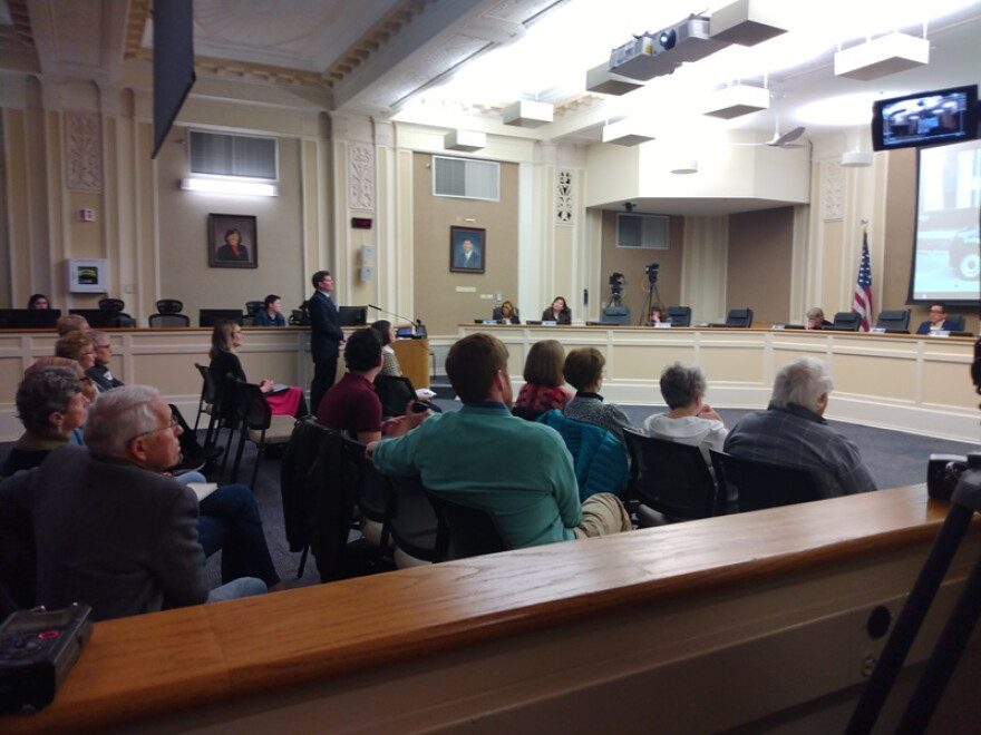 Lexington City Councilmember Chuck Ellinger, at podium, asked a council committee Tuesday to set aside $400,000 he said would attract another $1.6 million to fund a microtransit study. His request didn't receive a vote.