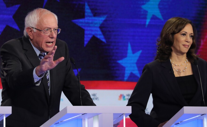 Democratic presidential candidates Sen. Bernie Sanders of Vermont and Sen. Kamala Harris of California both argued that the economy is not working well for average Americans on stage Thursday at the Democratic presidential debate.