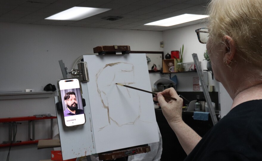 Alison Schuchs sketches her painting of Derek Galvan during a June 24 session at the Art Center of Corpus Christi. Schuchs is a featured artist for the exhibit "Portraitures: Four Perspectives" at the Beeville Art Museum.