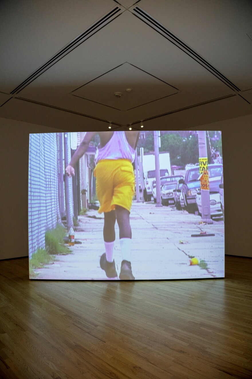 "I always just liked the way in which he owned the sidewalk," Bradford says of the man in his silent video,<em> Niagara.</em>