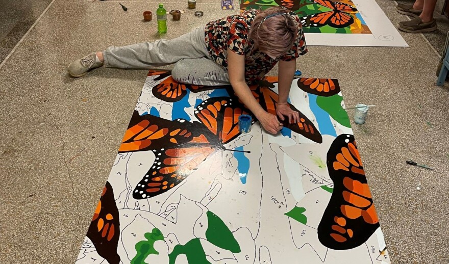 WIU students and other volunteers are helping paint the mural onto aluminum panels. Artist Bill Howard said the project is on schedule to be unveiled in mid-June.