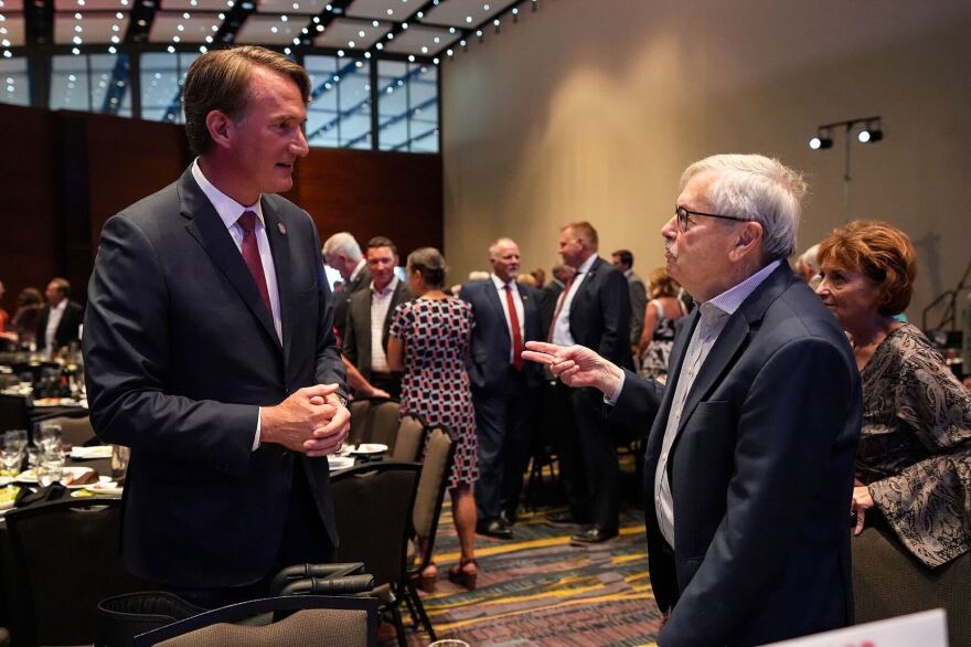 virginia governor glenn youngkin speaks with former iowa governor terry branstad