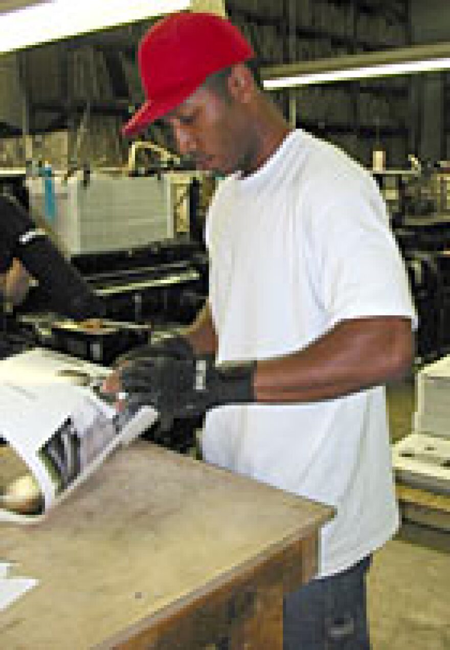 Karstent Jeffries, a convicted armed robber, works as a die cutter press operator at K & W Finishing Inc. in Baltimore.