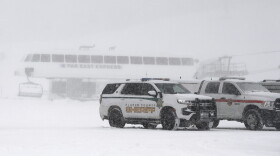 Placer County sheriff vehicles are parked near the ski lift at Palisades Tahoe where avalanche occurred on Wednesday, Jan. 10, 2024, in Tahoe, Calif.
