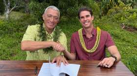 Maui County Mayor Richard Bissen, left, and Maui Land & Pineapple Company CEO Race Randle, right, have signed a memorandum of understanding for the county's acquisition of key West Maui water systems.