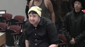 August Patton Scruggs speaks during the open forum portion of the Spokane City Council's November 6 meeting.