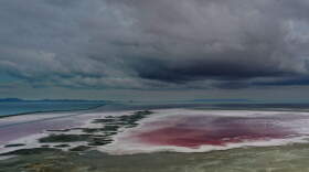 In an aerial view, an evaporation pond is pinkish-red due to high salinity levels leaves a crust of salt on the north section of the Great Salt Lake on August 02, 2021 near Corinne, Utah. (Justin Sullivan/Getty Images)
