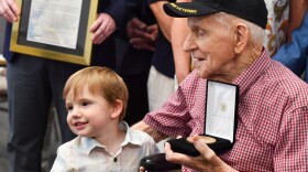 Sgt. Joseph Drake was honored in a ceremony at the Wayne County Courthouse for receiving the Congressional Gold Medal. He is one of only five surviving World War II Army Rangers. He holds his great-grandson, Everett Rotella, 3.