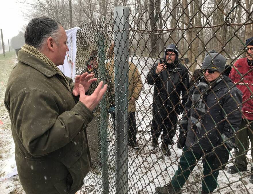 Russell Sipes, an attorney working for the Indiana Forest Alliance, told protesters Monday that the project was put on hold "until further notice."