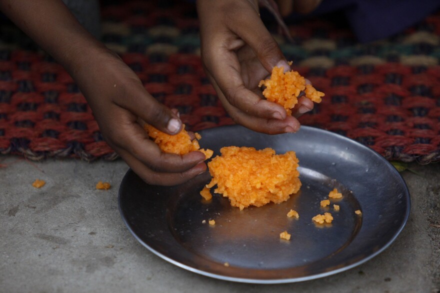 Sweetened rice is a popular dessert and snack in India. This dish, traditionally made with a pinch of saffron and cardamom powder, was served at a school on the outskirts of Jammu in northern India.