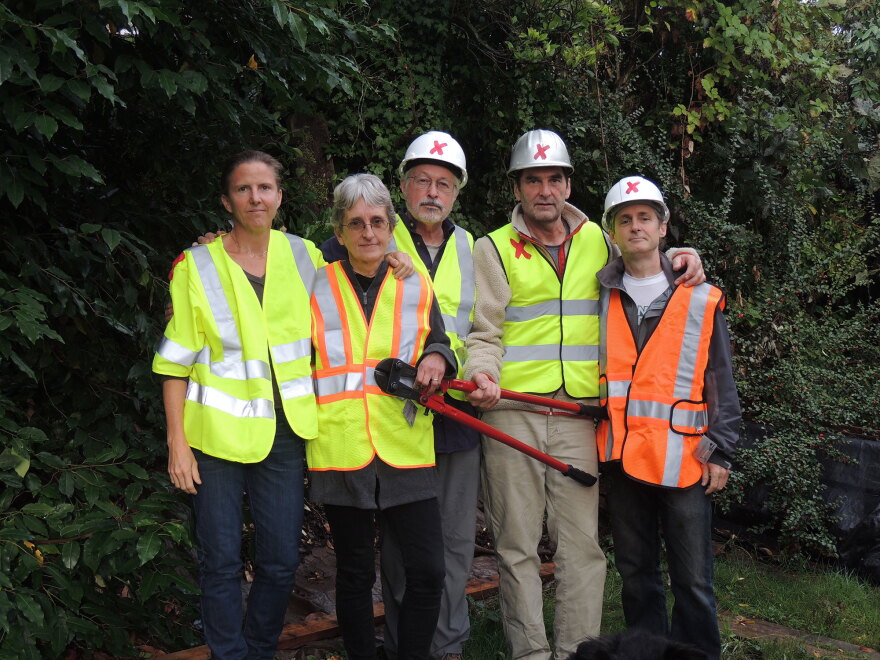 The five climate activists arrested after shutting down Canada-to-U.S. pipelines pose for a photo. They were identified by Climate Direct Action as (left to right): Emily Johnson, Annette Klapstein, Leonard Higgins, Ken Ward and Michael Foster.