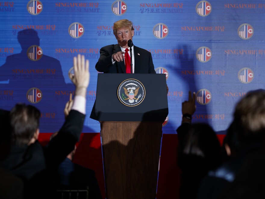 President Trump speaks during a news conference Tuesday after meeting with North Korean leader Kim Jong Un on Sentosa Island in Singapore.