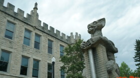 Stuck by lightning on Oct. 14, 1966, NIU’s iconic “Olive Goyle” grotesque celebrates 60 years of misfortune and campus folklore with a face full of smiles.