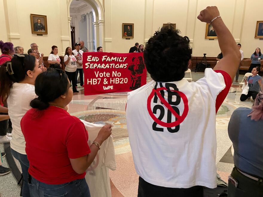 Immigrant rights activists with La Unión del Pueblo Entero (LUPE), protest outside the Texas House chamber ahead of a vote on House Bill 20