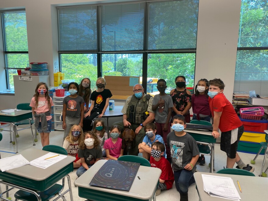 Bane and Master Deputy Glen Pedersen visit Ms. Kahrs's third-grade class at Winter Park Elementary.