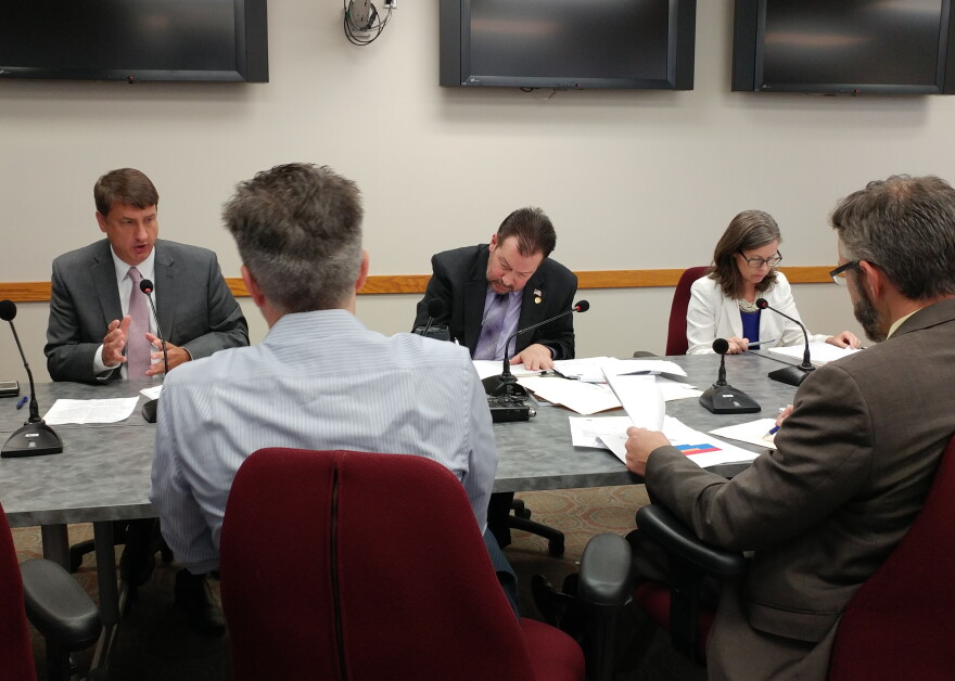 Hamilton County Commissioner Chris Monzel (left) lays out his opposition to the sales tax hike.