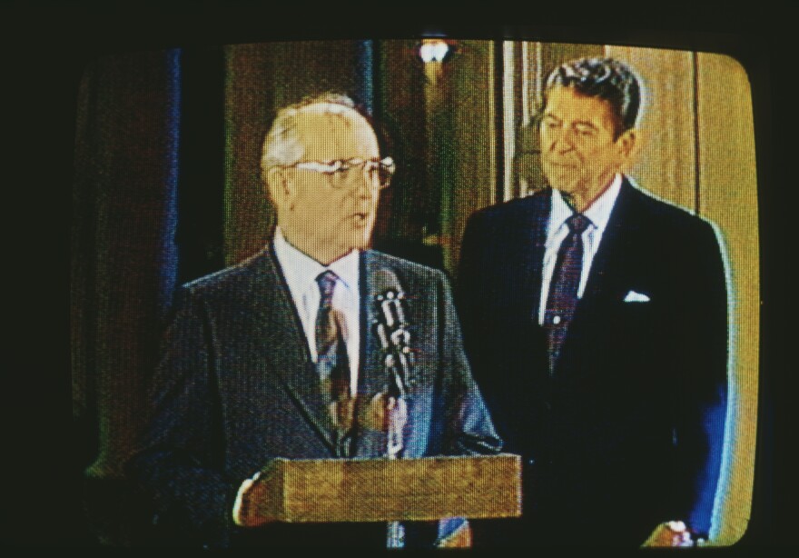 Mikhail Gorbachev and President Ronald Reagan on television on Dec. 8, 1987. They met in Washington to sign a treaty that banned intermediate-range nuclear missiles.